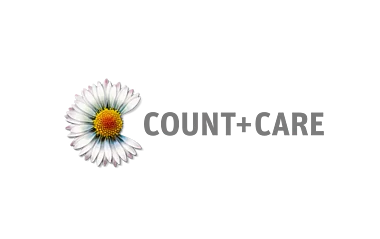 Logo der COUNT+CARE. Blütenblattmuster mit detaillierten Texturen und Farbverläufen.
