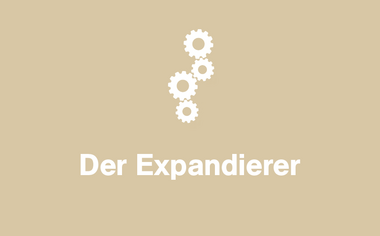 Grafik "Der Expandierer". Zahnräder ineinandergreifend, symbolisieren Mechanik und Zusammenspiel.